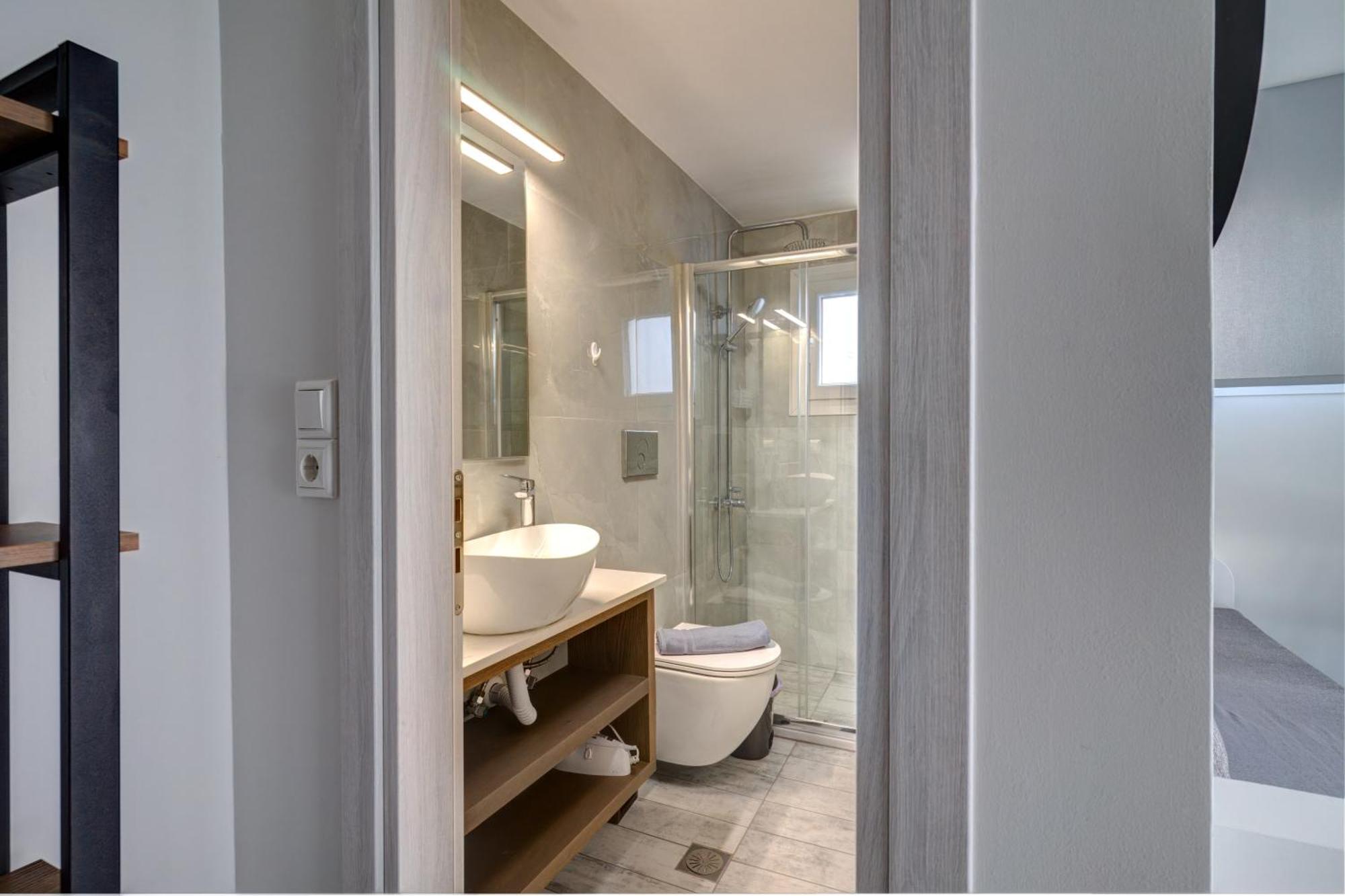 Molos Beachfront Apartments In Диакоптон Экстерьер фото