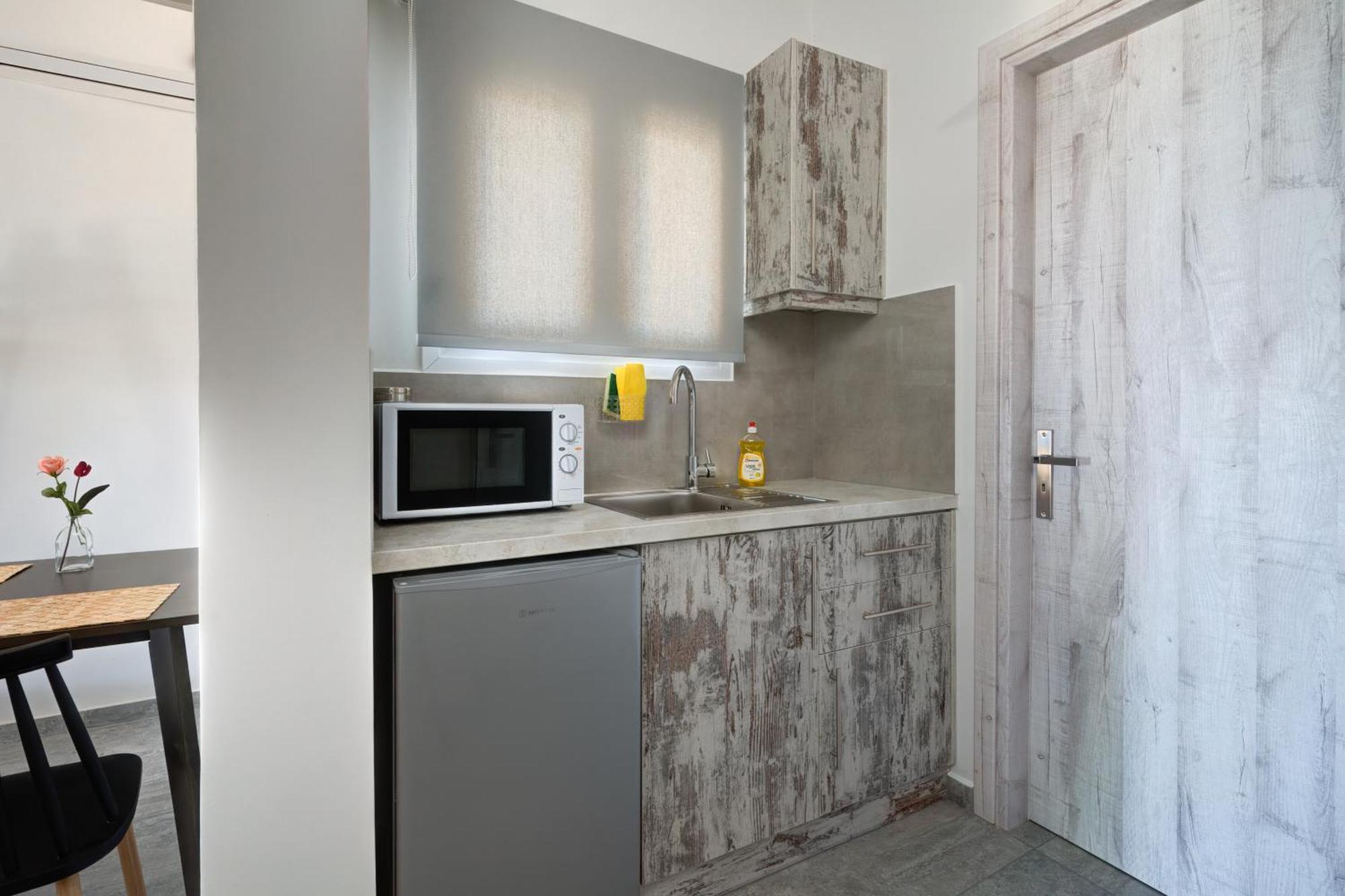 Molos Beachfront Apartments In Диакоптон Номер фото